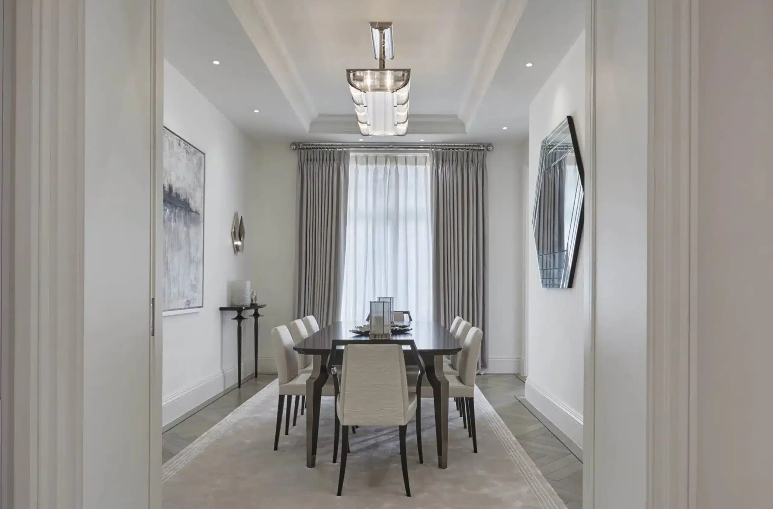 Dining room from sideview with grey colour scheme as designed by katharine pooleys design studio in london