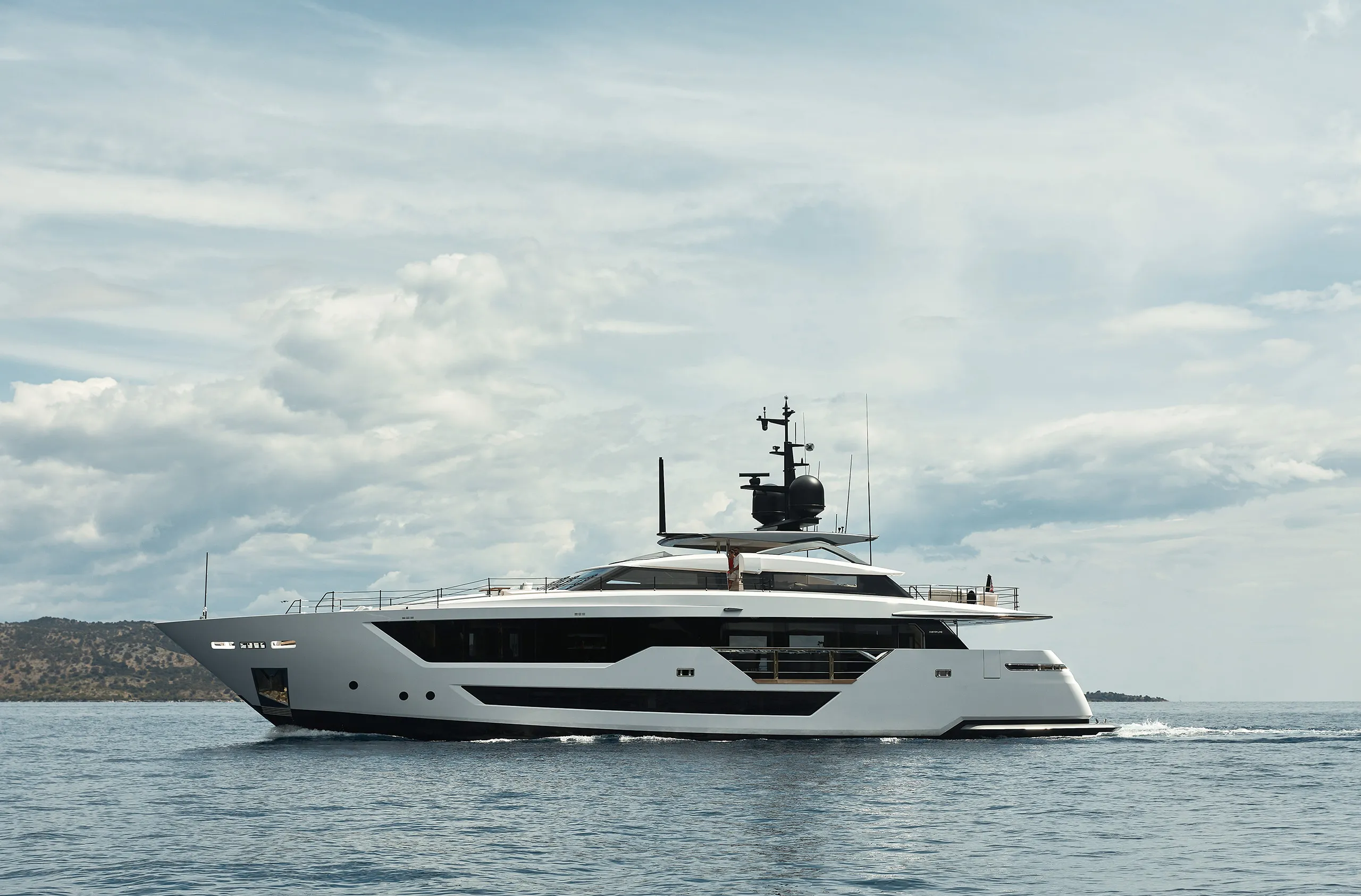 A profile view of the KPL designed superyacht Custom Line 106 underway in the Med
