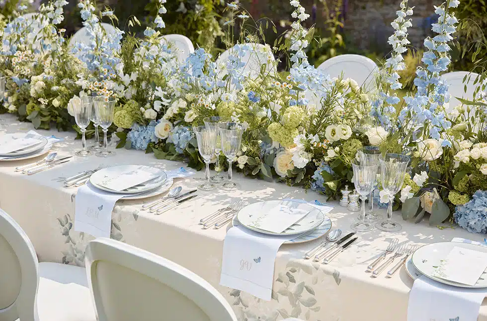 A table set and ready to go for a fine dining event in the sun