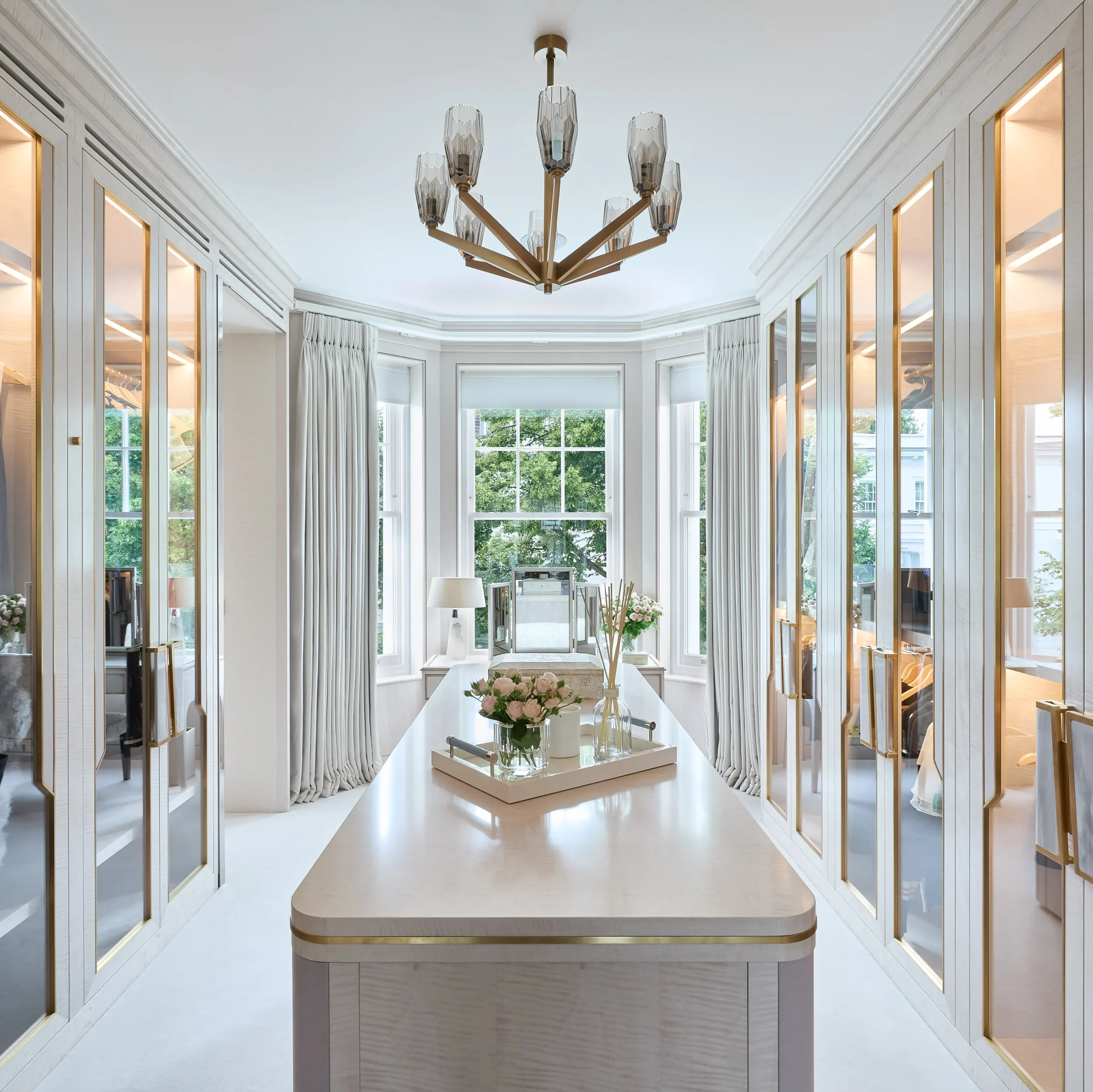 A luxurious dressing room in a notting hill home, interior design and bespoke joinery completed by katharine pooley