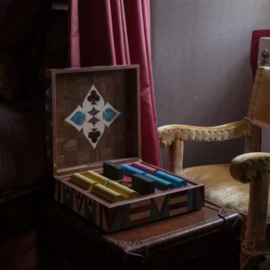 Geometric handmade marquetry poker set by alexandra llewyn and katharine pooley pictured at forter castle