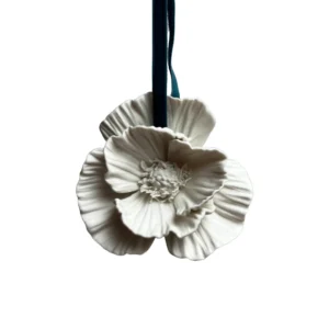 A poppy porcelain ceramic christmas tree decoration made in britian by katharine pooley