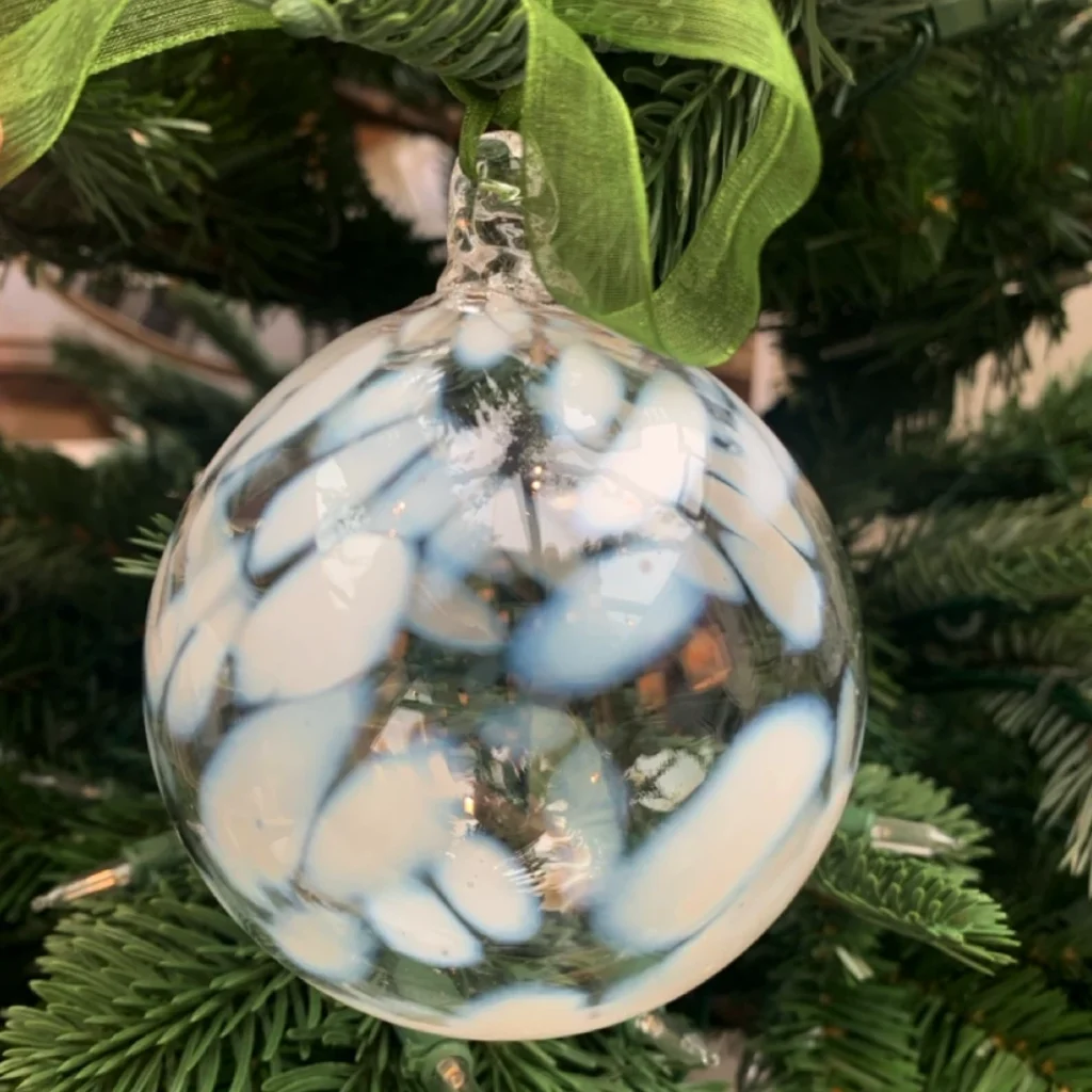 Snow white christmas baubles from the katharine pooley boutique is the perfect unique christmas addition