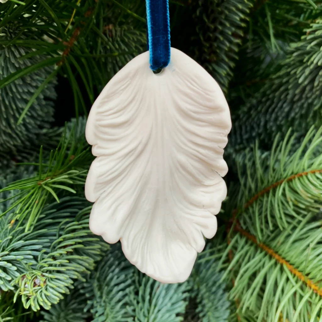 A tulip petal christmas tree ornament by Katharine Pooley