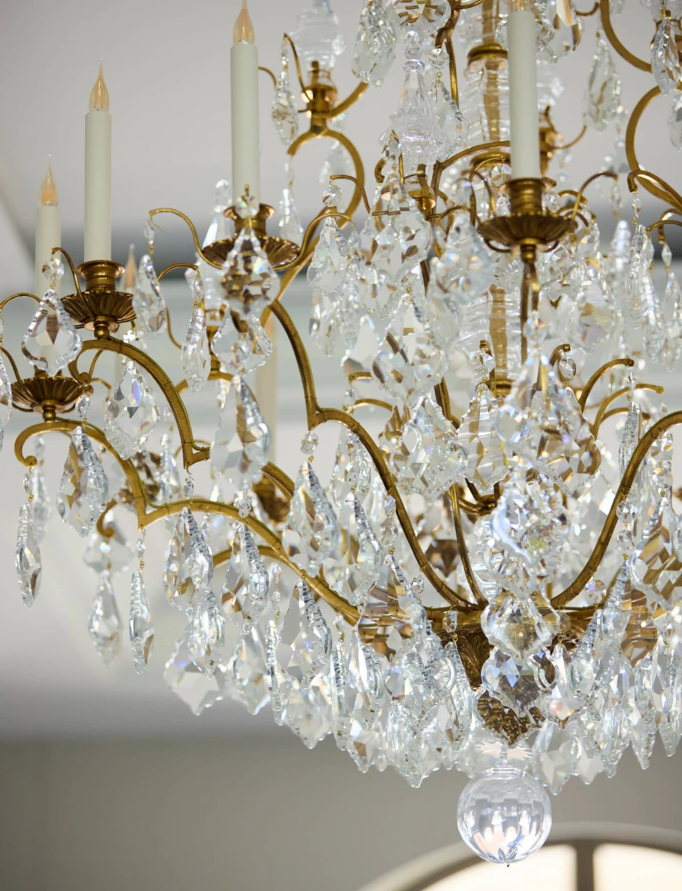 a glass chandelier in a katharine pooley designed home