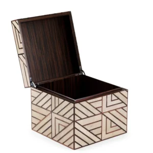 An open view of a beautiful shagreen box with an art deco inspired inlay at the katharine pooley boutique