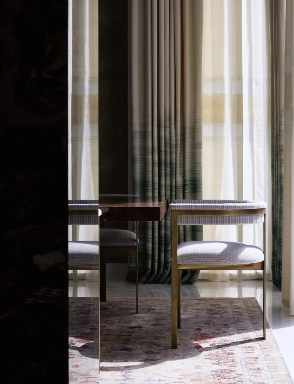 A handcrafted dining chair designed by in-house furniture designers at katharine pooley