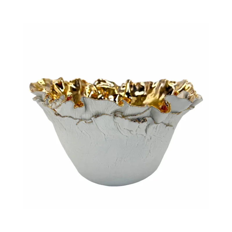 A side detail of the Parmelia Gold Bowl a piece of luxury home decor by the Katharine Pooley Boutique handmade in London