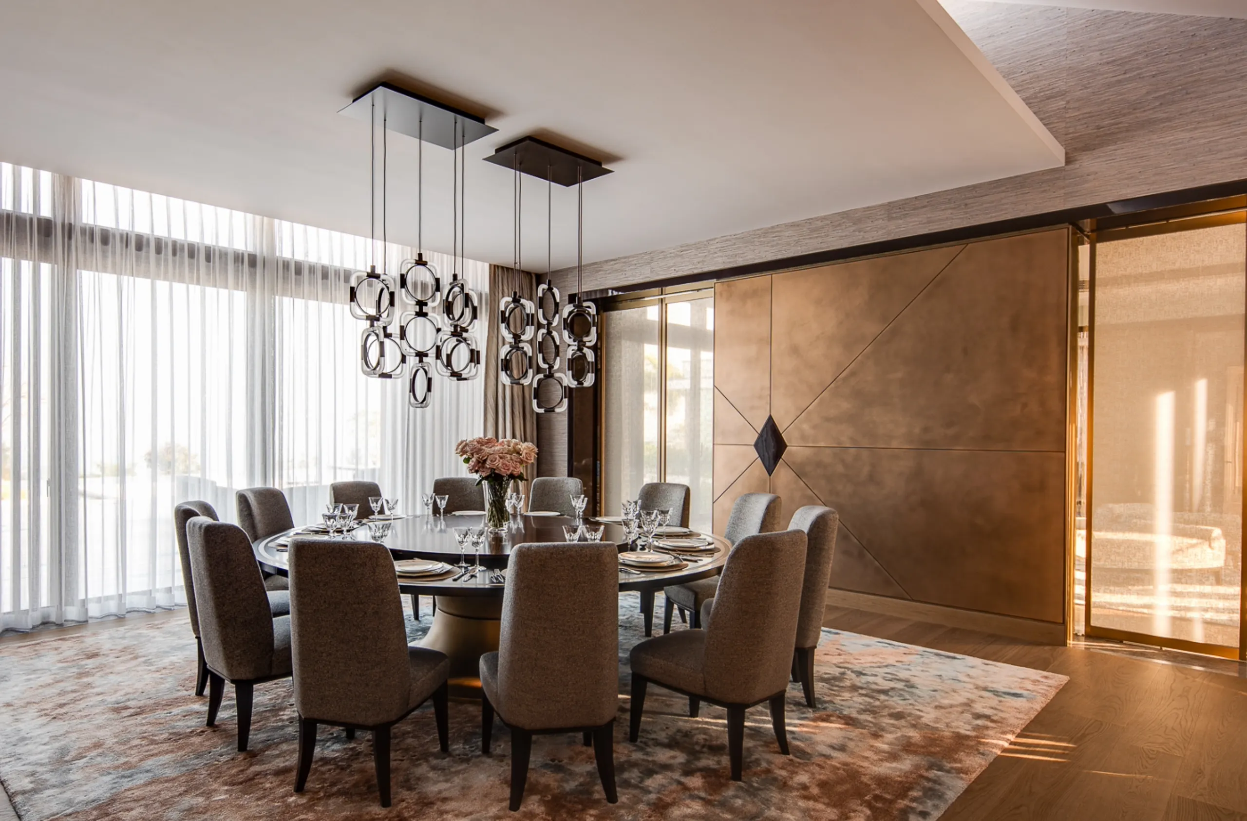 Opulent dining room interior designed by British interior designer Katharine Pooley in Discovery Bay, Hong Kong, featuring luxurious finishes and stylish decor