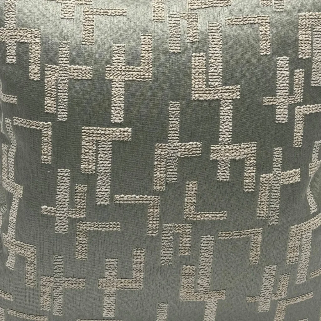 A beautiful embroidered pattern on one of Katharine Pooleys bespoke cushions from her Chelsea boutique