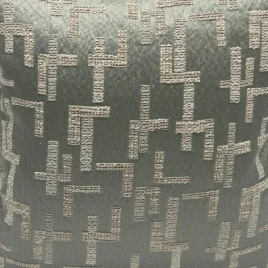 A beautiful embroidered pattern on one of Katharine Pooleys bespoke cushions from her Chelsea boutique
